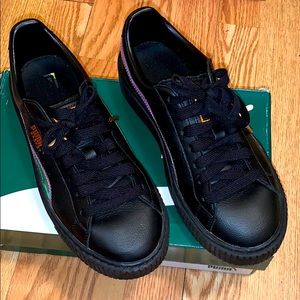 pumas black and iridescent